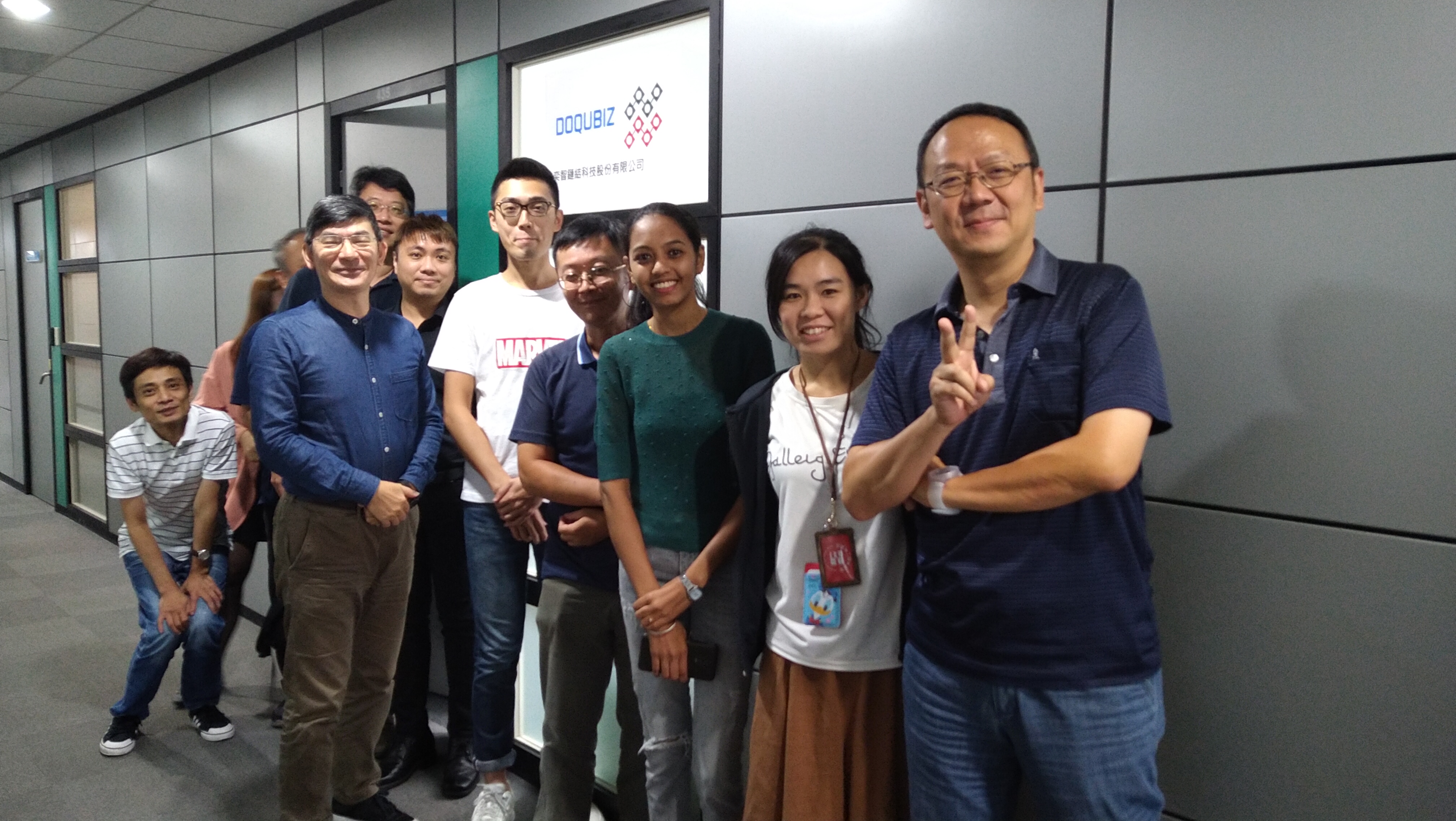 Caption: Keng Lee (First Row 1), DoQubiz CEO and his team
